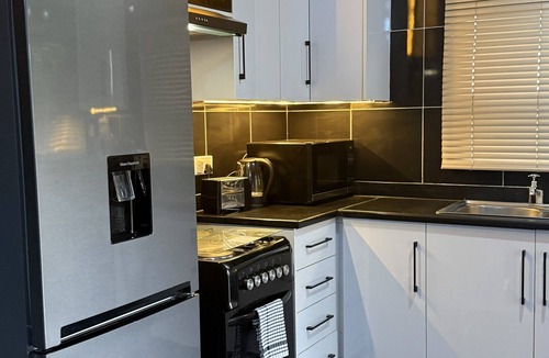 Harare East House | Spacious, bright, inviting 2‑bed home in a secure, affluent neighbourhood.