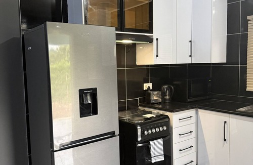 Harare East House | Spacious, bright, inviting 2‑bed home in a secure, affluent neighbourhood.