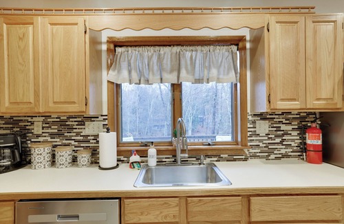 Pocono Lake House | Spacious Creek Front 6-bedroom home-Lake/Pool/Kayaks/Hot Tub/Game Rm/Fire Pit.