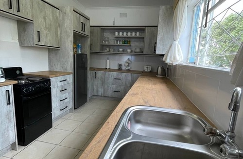 Bulawayo House | Spacious family home. A stroll away from a vibrant shopping centre & golf course