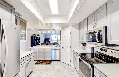 Port Canaveral Condo | Stunning Port Canaveral Cruise Views W/Covered Balcony, Large Unheated Pool, Fitness & BBQ Grills!