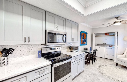 Port Canaveral Condo | Stunning Port Canaveral Cruise Views W/Covered Balcony, Large Unheated Pool, Fitness & BBQ Grills!