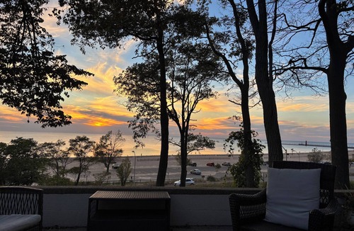 Grand Haven Cottage | Summer Breeze-Lake Michigan Views + Hot Tub ~ Steps to Beach Access