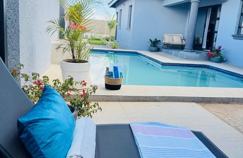 Bulawayo Villa | The Palm Nest: Escape the ordinary, stay where serenity meets style.