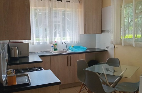 Harare House | The Village Cottages