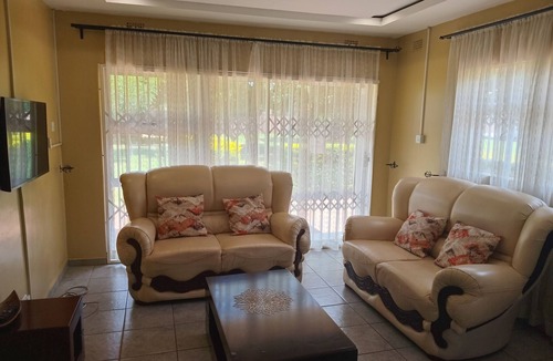 Harare House | The Village Cottages