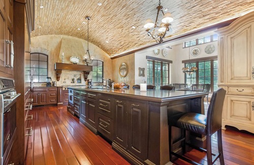 Holland Villa | Timeless Euro Tuscan gated estate on 14.5 acres with vineyard, pond and gardens.