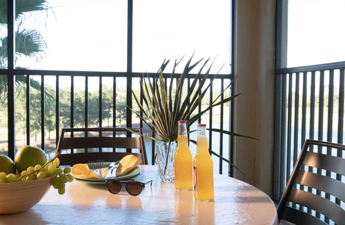 Orange Lake Villa | Ultimate Family & Business Getaway: Spacious 2BR villa, pool, golf, & much more.