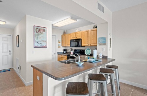 Waterside Village Condo | Waterside Village 408 - Stunning Gulf Views, Pool + Day Dock - Summer SALE!