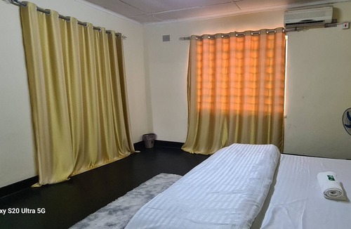 Kitwe House | We also have Indian/Zambian Restaurant adjacent to this lodge