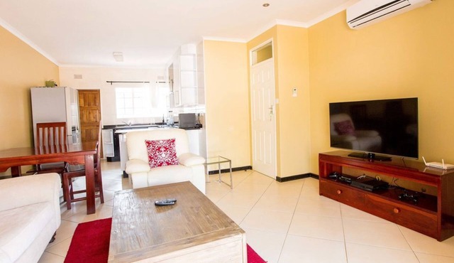 2 Bed roomed fully furnished and secure apartment,very close to shopping center.