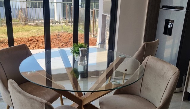 Charming 2Beds-3Baths Apt with WiFi and backup solar in Ibex Kingsland Lusaka 1