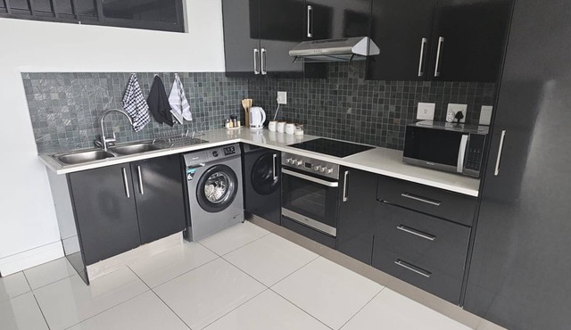 Chic 2-bedroom apartment with WiFi, gym in awesome central Windhoek.