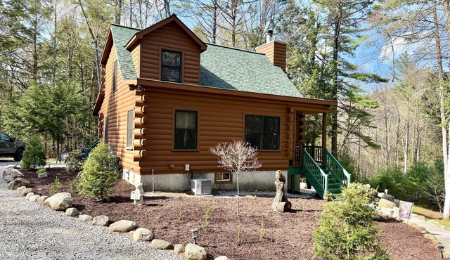 Log Cabin on 30 acres on Kelm Pond