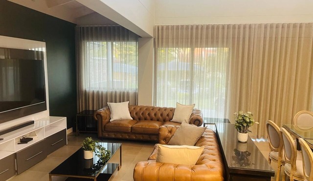Modern 3-Bedroom House with Private Garden & Parking. Close to amenities