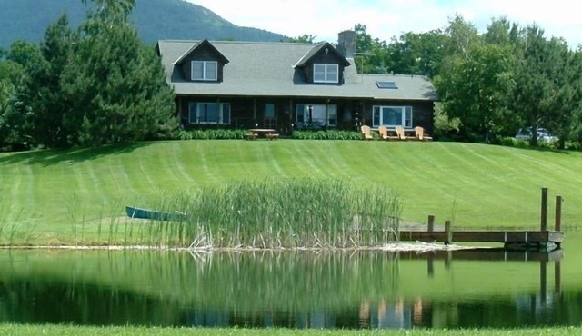 Private Country Log Home with Spectacular Views and Pond on 11 Acres