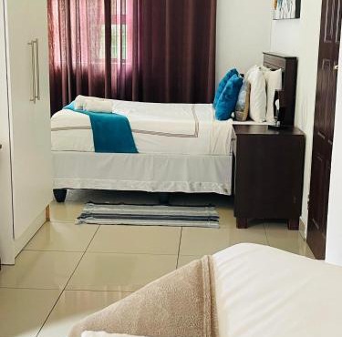 Real Favour Suites Guest House