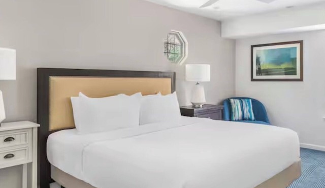 Relax in a 2-bedroom unit at Beachwoods by Hilton Resort in OBX Kitty Hawk, NC.