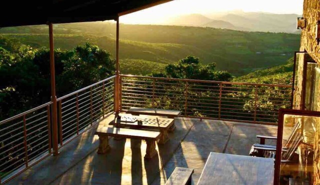 Rustic stone walls with modern conveniences in an African setting.