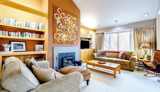 Ski-in/out condo steps from the lifts/village with fireplace & mountain views