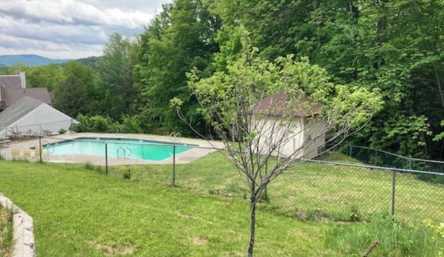 Ski-in/ski-out condo near the slopes with pool, fast WiFi & garden-level patio