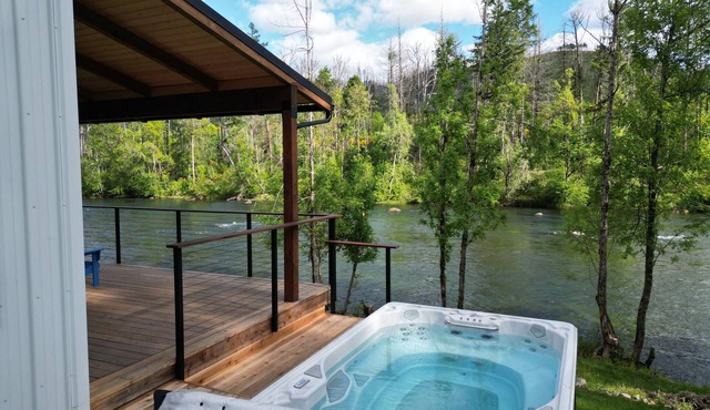 Two Master Suites and a Hot Tub on the River
