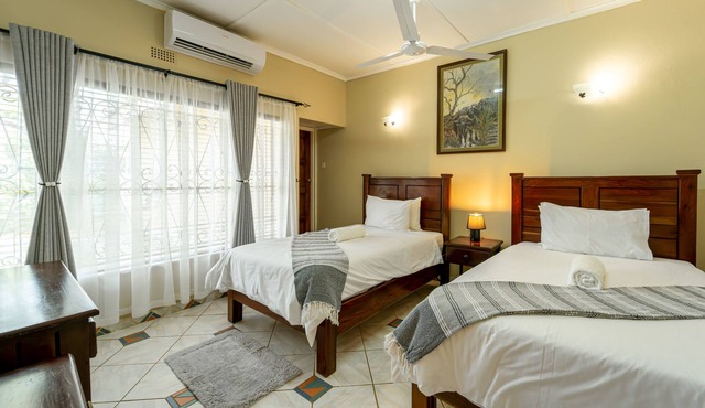 Zambezi Family Lodge - Buffalo Room