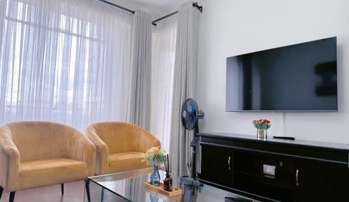 One-Bedroom Apartment with Balcony and City View